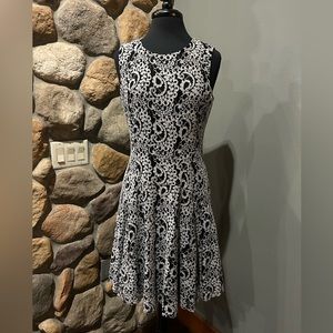Women’s size 12 dress with lace design.